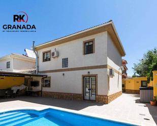 Exterior view of House or chalet for sale in Vegas del Genil  with Air Conditioner, Terrace and Swimming Pool