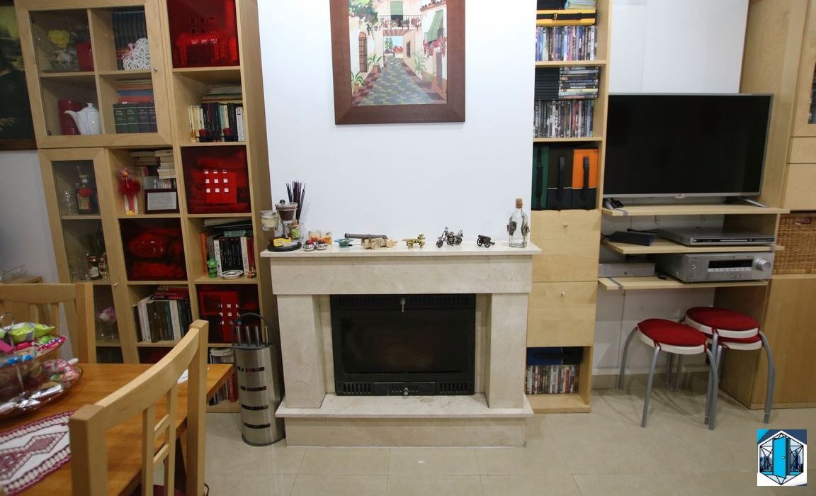 Sala d'estar de Casa adosada en venda en San Juan del Puerto amb Aire condicionat, Moblat i Balcó