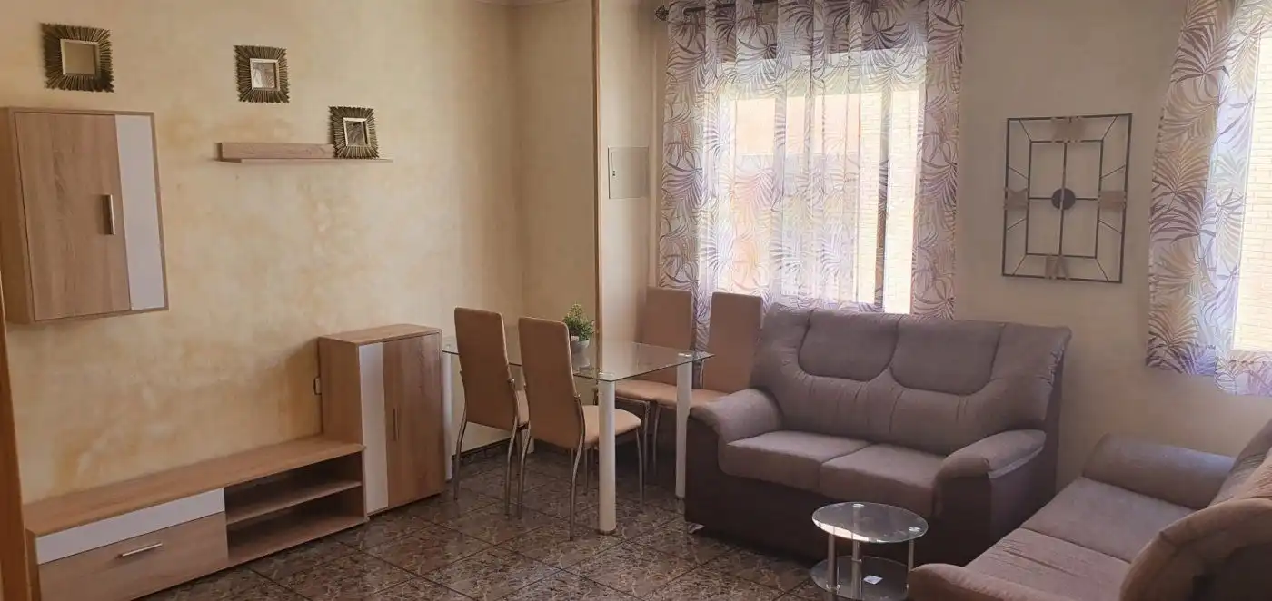 Sala d'estar de Casa adosada en venda en Orihuela amb Terrassa i Moblat