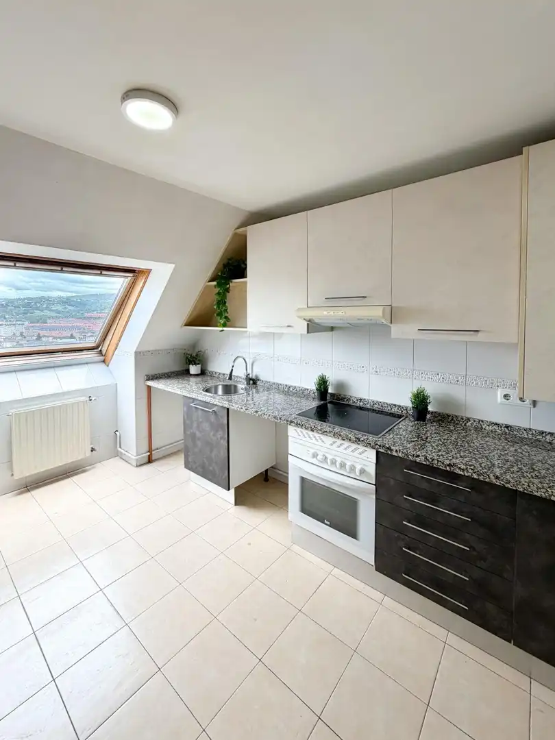 Kitchen of Attic for sale in Oviedo   with Heating, Parquet flooring and Storage room