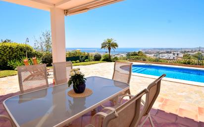 Terrace of House or chalet for sale in Benalmádena  with Air Conditioner, Heating and Private garden