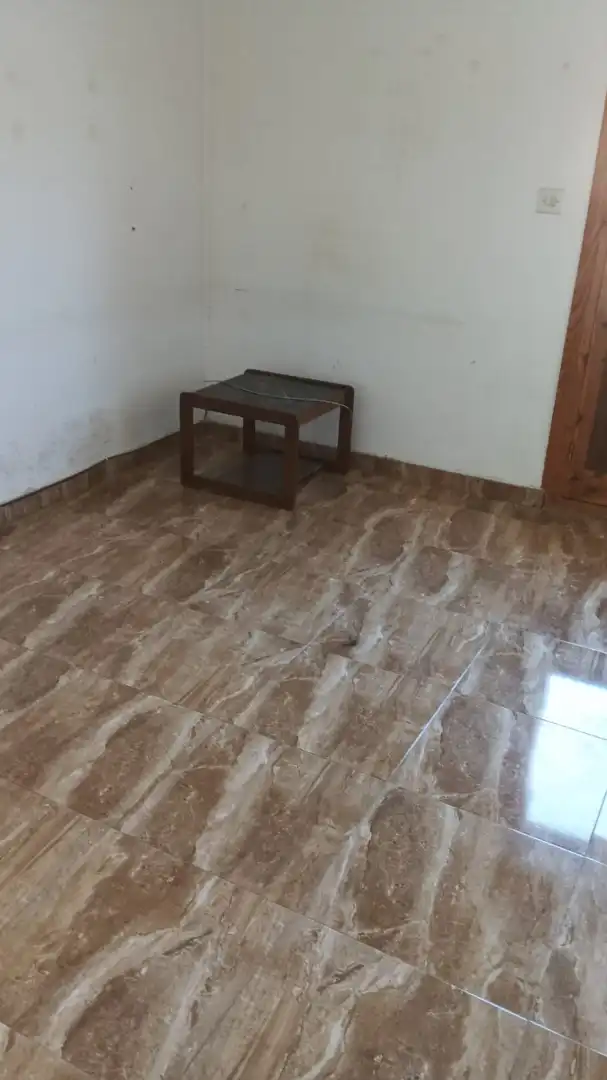 Sala d'estar de Casa o xalet en venda en Baza amb Calefacció, Terrassa i Traster