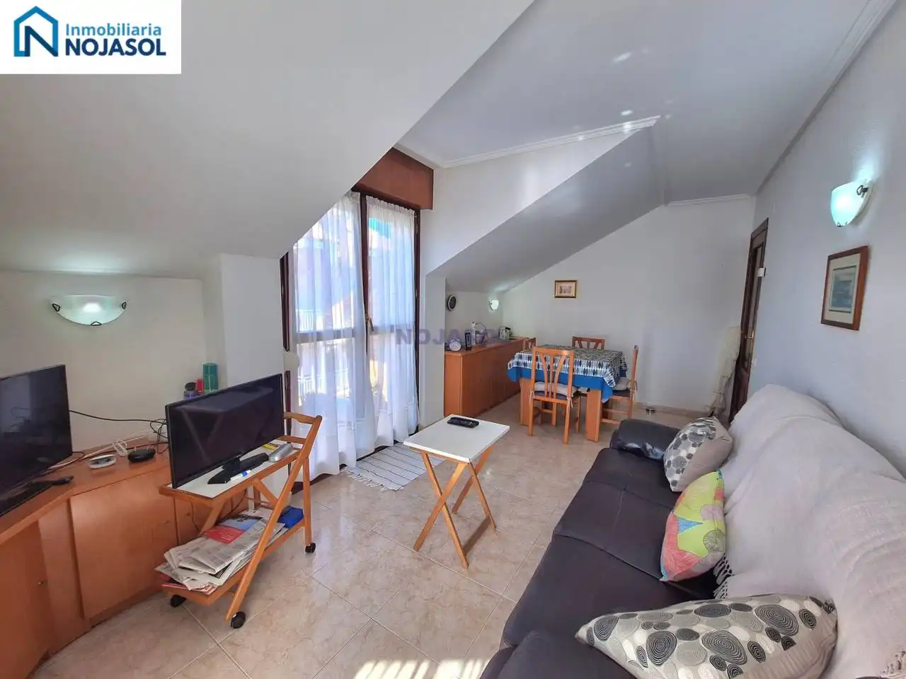 Sala d'estar de Apartament en venda en Noja amb Calefacció, Terrassa i Moblat