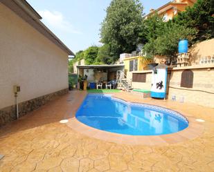 Swimming pool of House or chalet for sale in Lloret de Mar  with Air Conditioner, Terrace and Swimming Pool