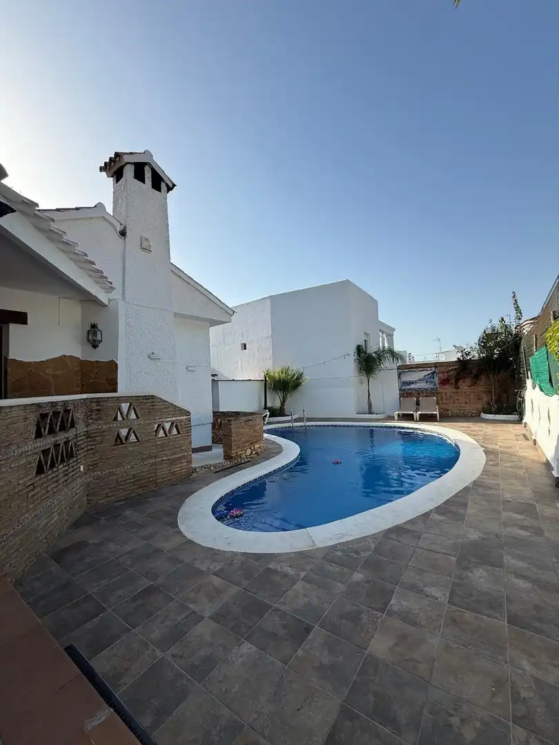 Piscina de Casa o chalet de alquiler en Punta Umbría con Aire acondicionado, Jardín privado y Terraza