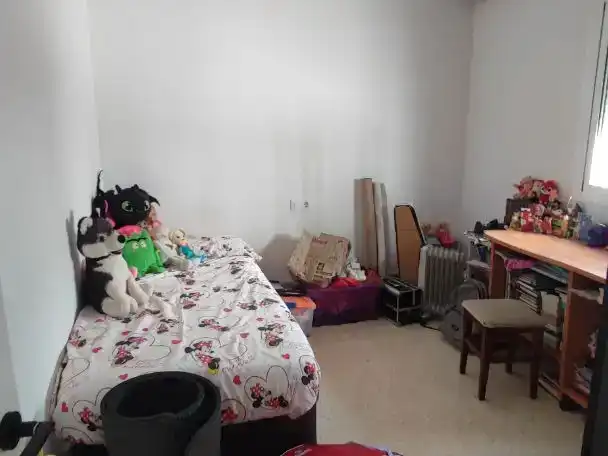 Dormitori de Casa adosada en venda en Lora del Río amb Aire condicionat