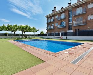 Swimming pool of Planta baja for sale in Pineda de Mar  with Air Conditioner, Heating and Private garden