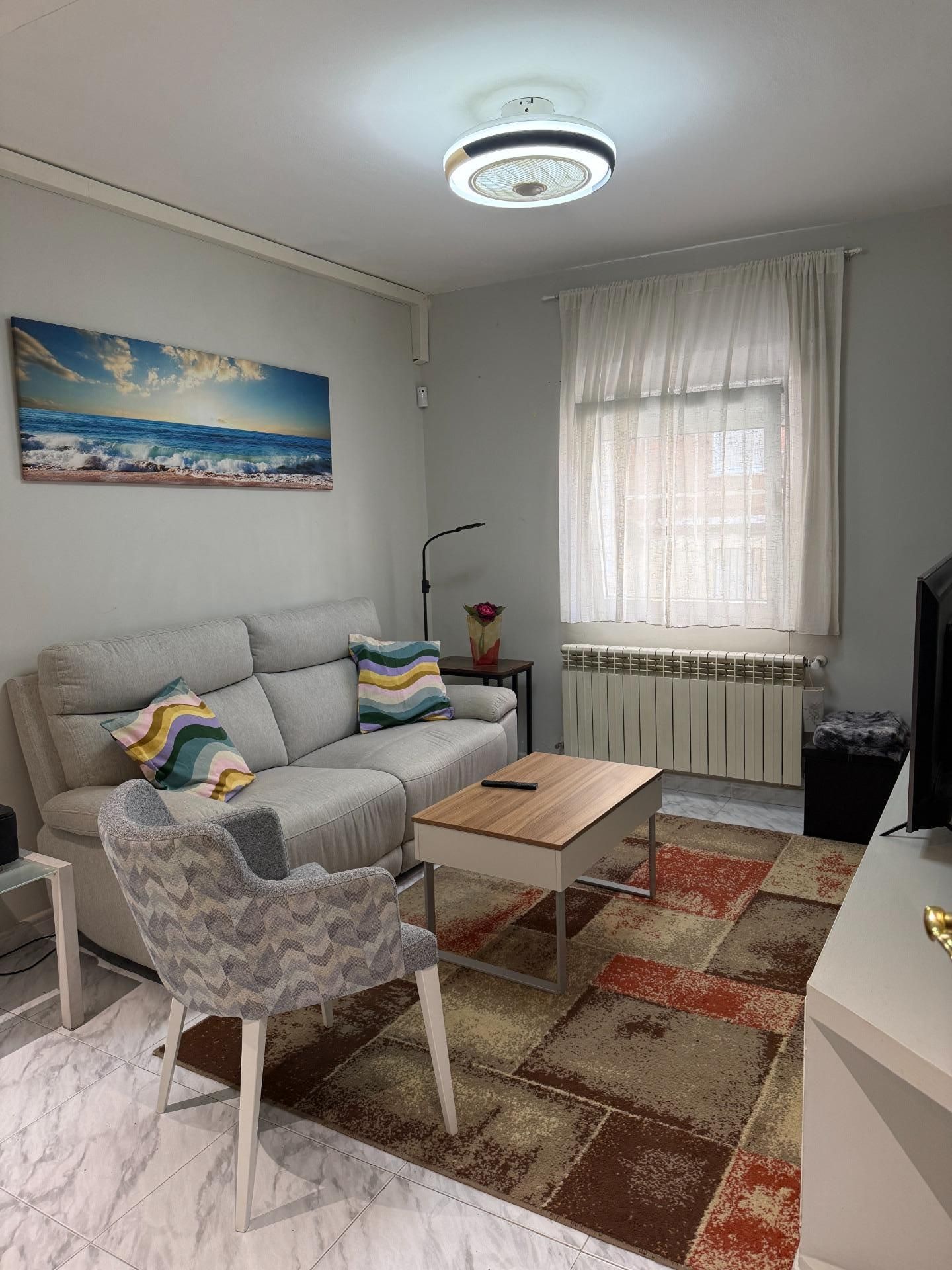 Sala de estar de Piso en venta en  Madrid Capital