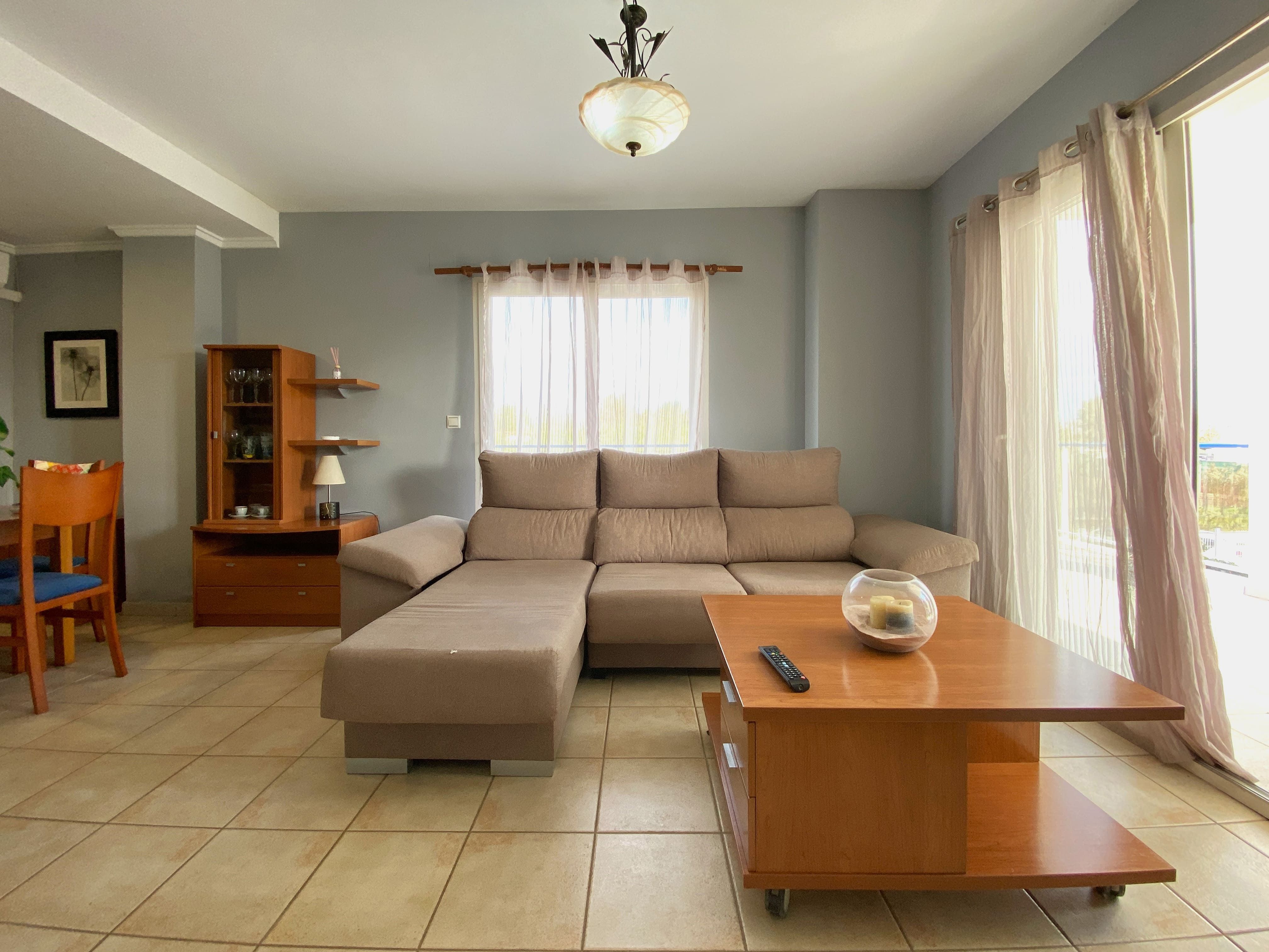 Sala de estar de Piso en venta en Oliva con Terraza, Amueblado y Piscina comunitaria