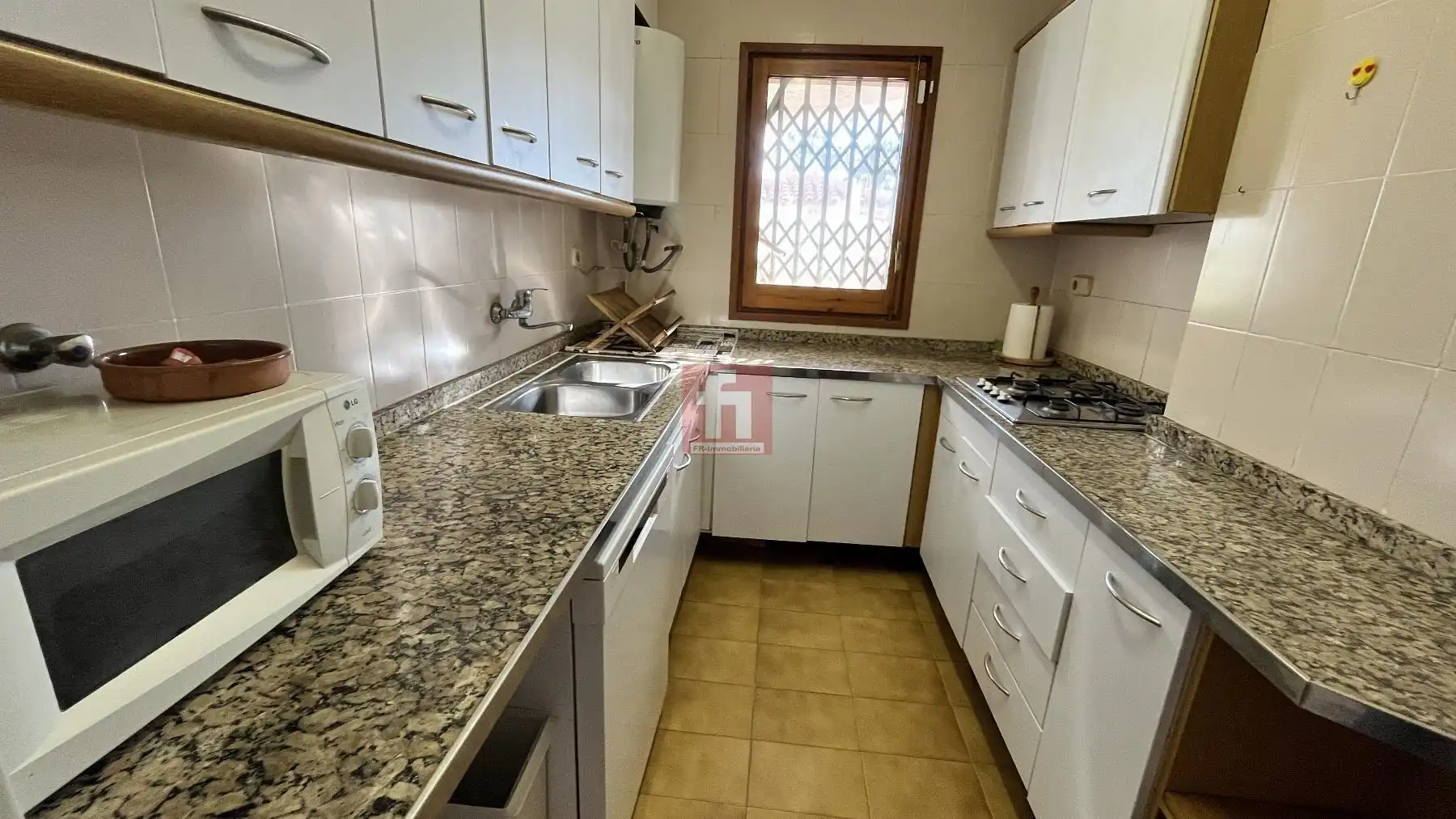 Cocina de Casa adosada en venta en Creixell con Balcón y Piscina comunitaria