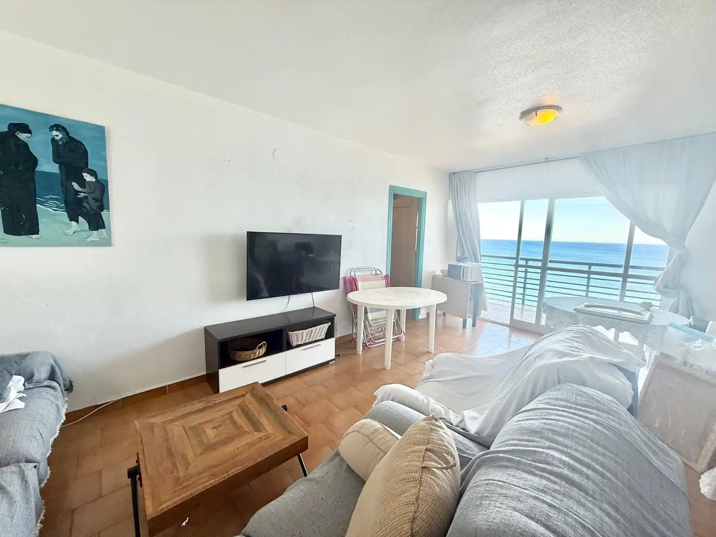 Sala d'estar de Apartament de lloguer en La Manga del Mar Menor amb Calefacció, Terrassa i Piscina