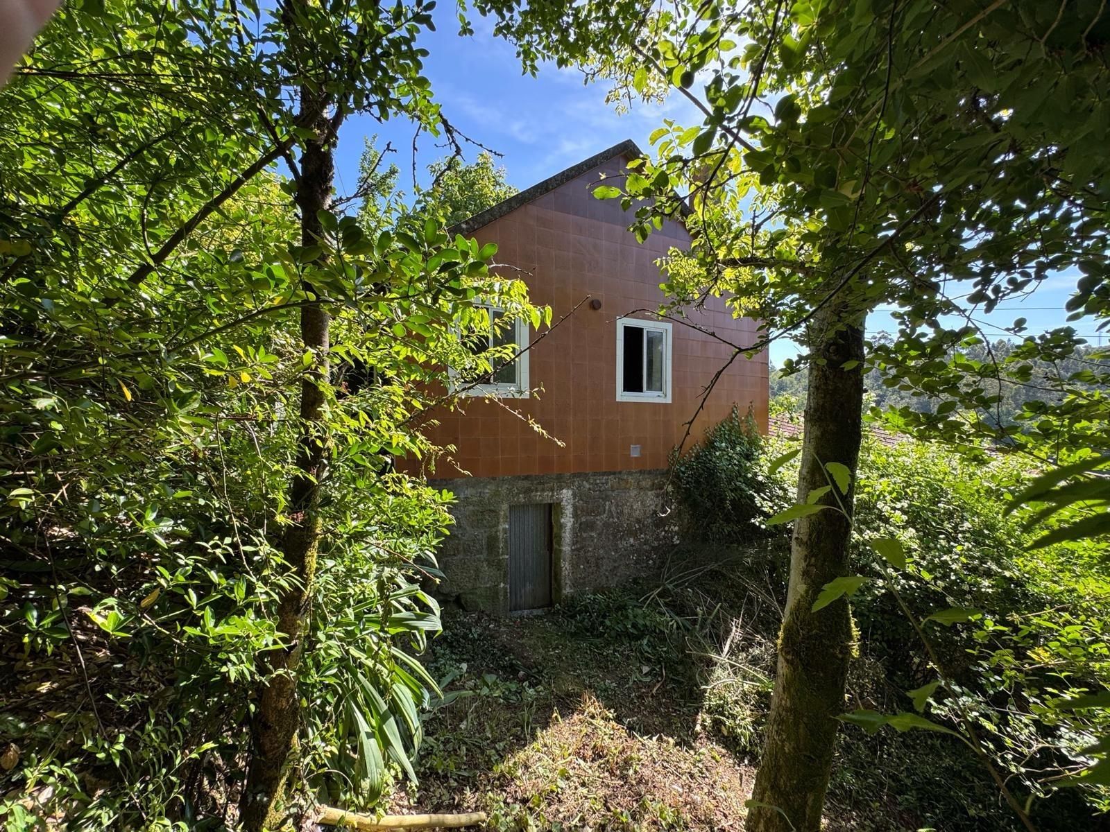 Vista exterior de Casa o xalet en venda en A Lama   amb Jardí privat