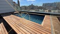 Swimming pool of Attic for sale in  Barcelona Capital  with Air Conditioner, Heating and Private garden