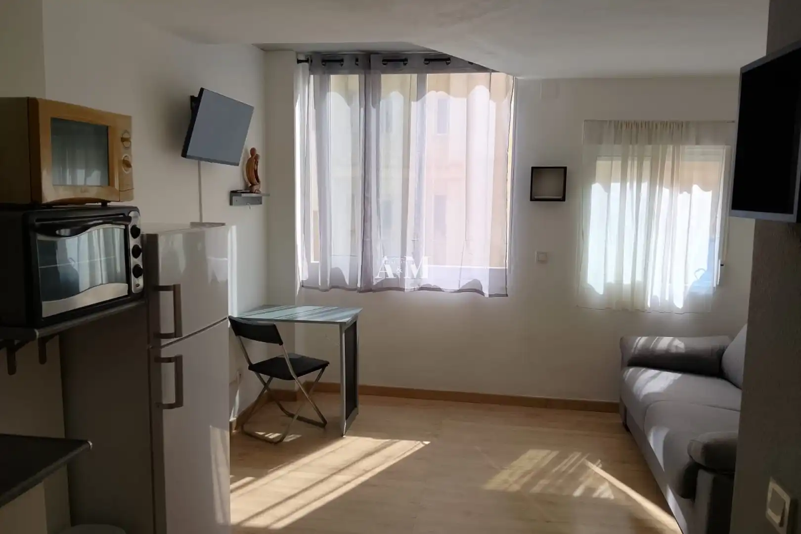 Sala d'estar de Estudi de lloguer en Playa del Cura