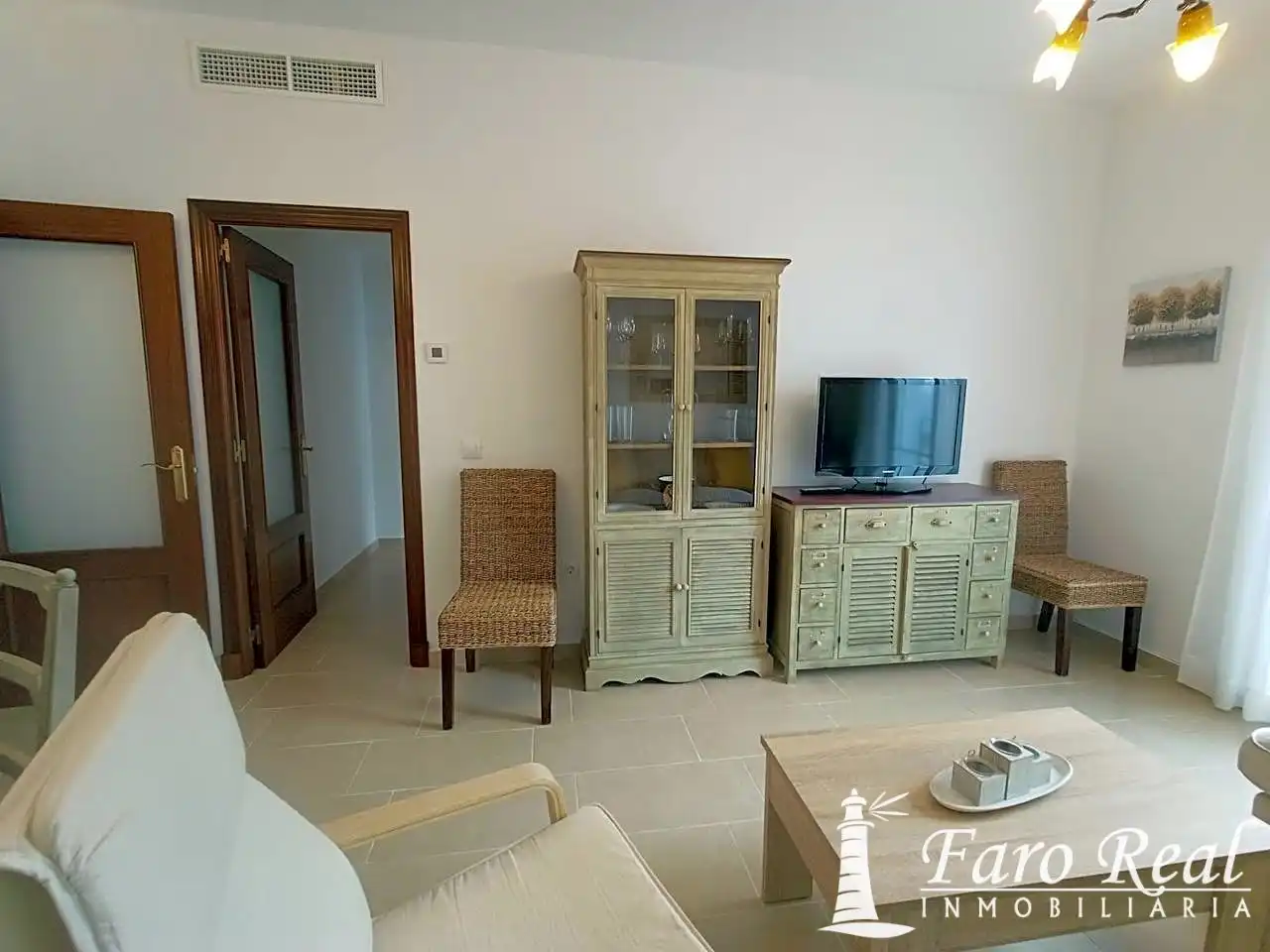 Sala d'estar de Apartament de lloguer en Sanlúcar de Barrameda amb Aire condicionat i Moblat