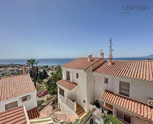 Exterior view of Single-family semi-detached for sale in Rincón de la Victoria  with Air Conditioner, Terrace and Balcony