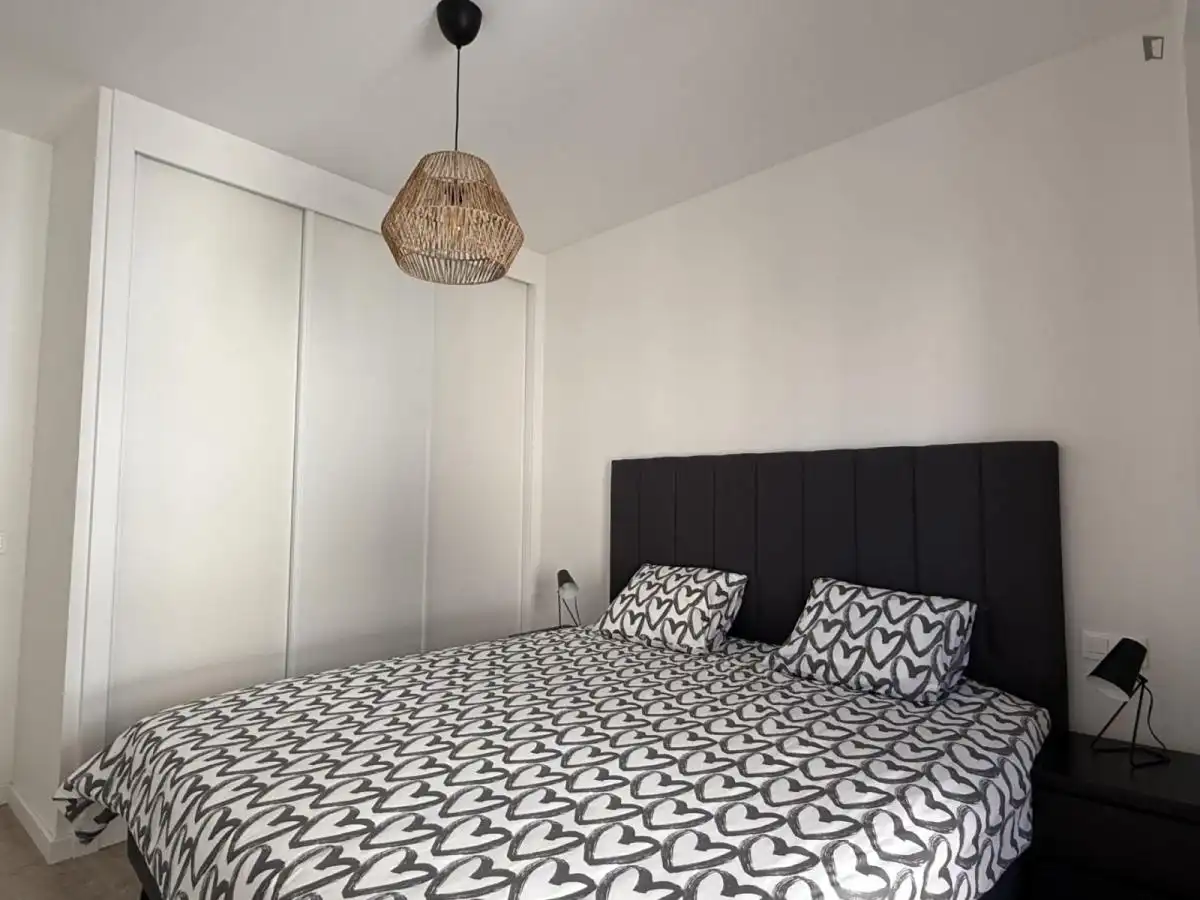 Dormitori de Apartament de lloguer en Málaga amb Aire condicionat, Calefacció i Moblat
