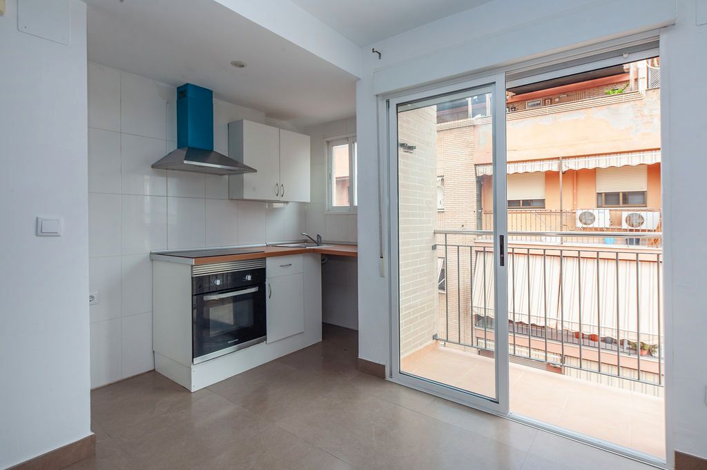 Kitchen of Attic for sale in Paterna  with Air Conditioner and Oven