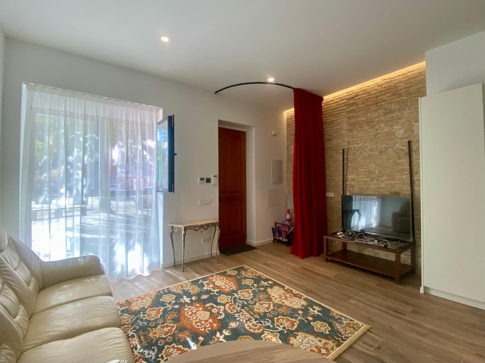 Living room of Planta baja for sale in  Valencia Capital  with Air Conditioner, Heating and Terrace