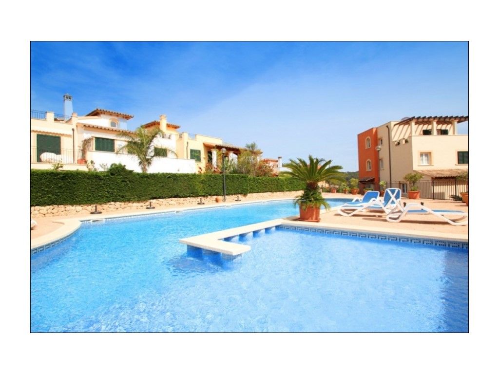 Piscina de Casa adosada de lloguer en Andratx amb Aire condicionat, Jardí privat i Terrassa