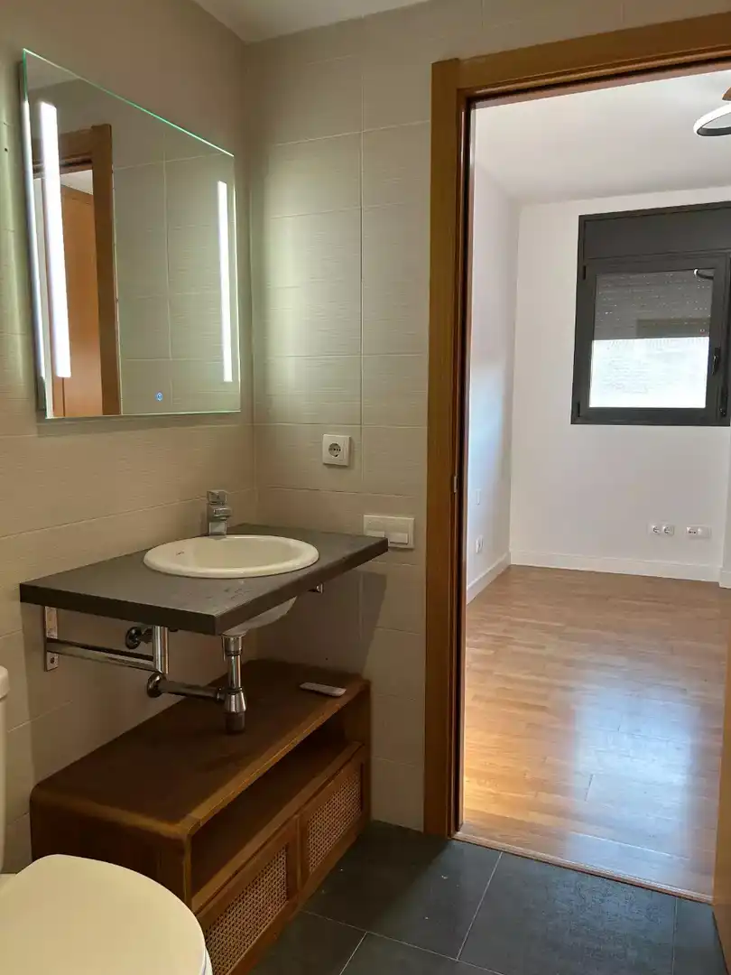 Bathroom of Flat for sale in Hostalric  with Parquet flooring, Terrace and Storage room