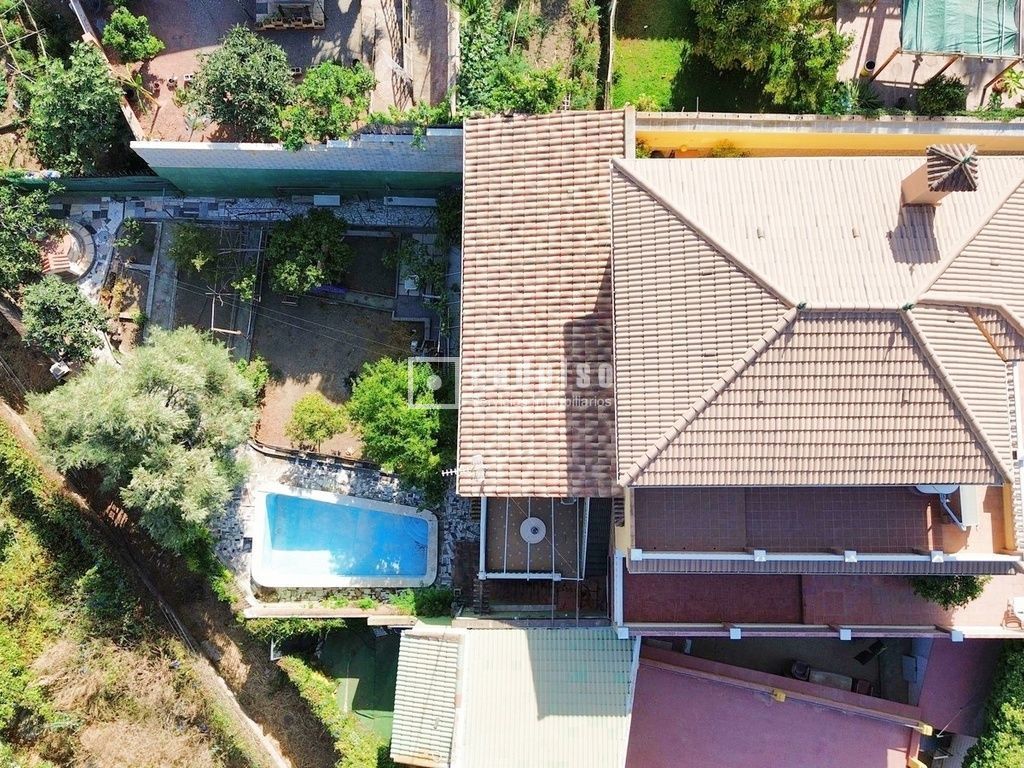 Exterior view of House or chalet for sale in Málaga Capital  with Air Conditioner, Terrace and Storage room