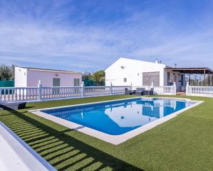 Swimming pool of House or chalet for sale in Pilas  with Air Conditioner, Heating and Private garden