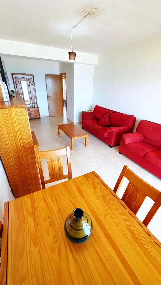 Sala de estar de Apartamento en venta en Gandia con Amueblado, Balcón y Piscina comunitaria