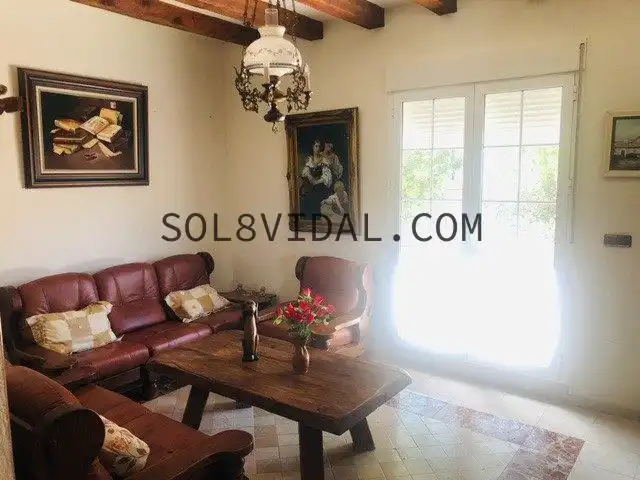 Sala d'estar de Casa o xalet en venda en Orihuela amb Aire condicionat, Jardí privat i Terrassa