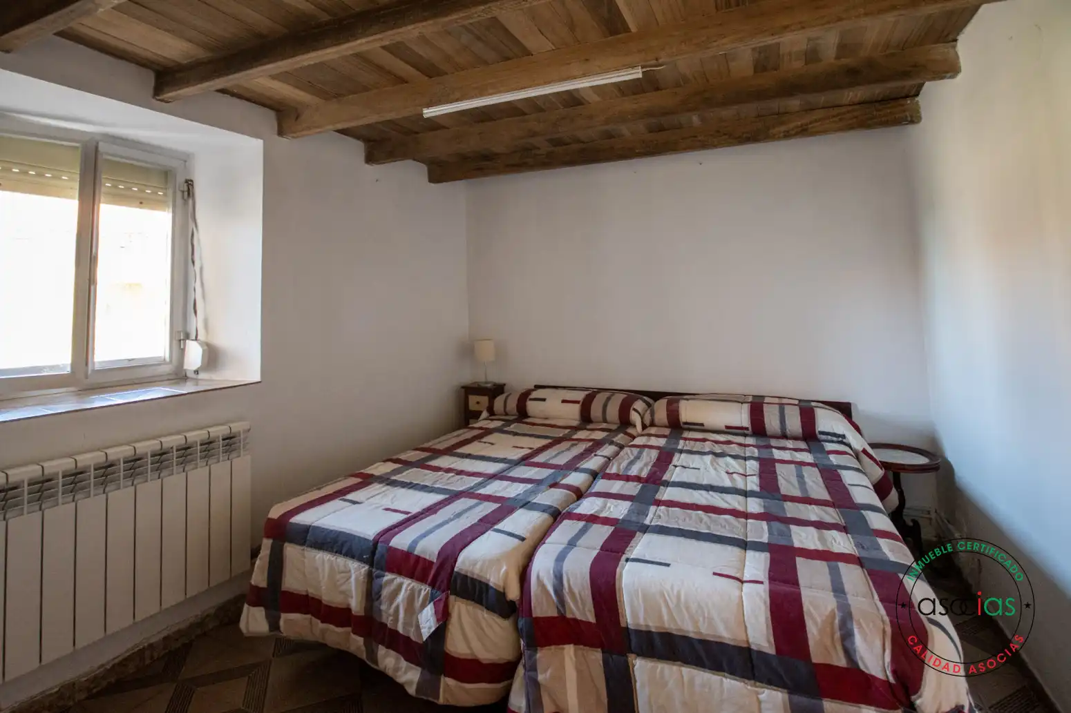 Schlafzimmer von Einfamilien-Reihenhaus zum Verkauf in Colunga mit Heizung