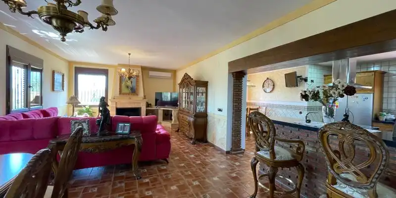 Sala d'estar de Casa o xalet en venda en Loja amb Aire condicionat, Jardí privat i Terrassa