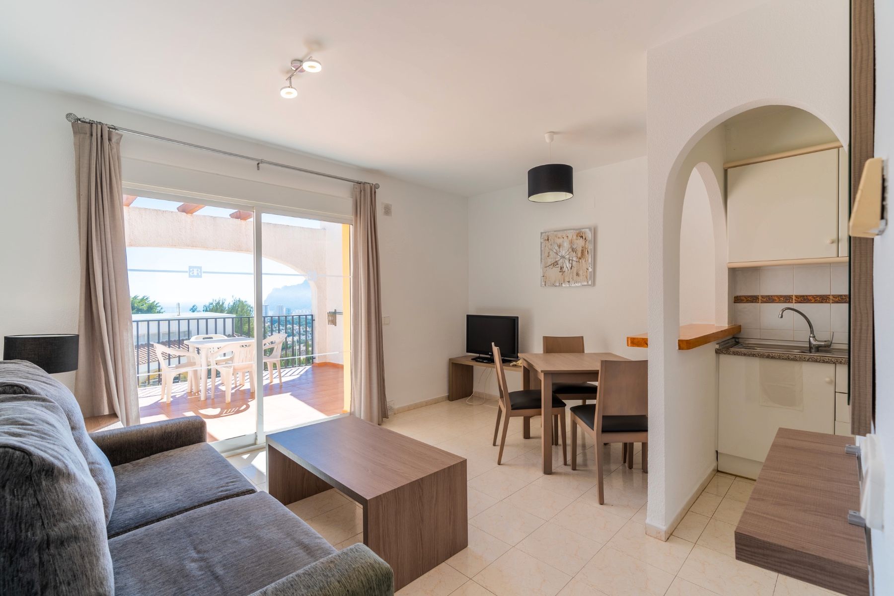 Living room of Flat for sale in Calpe / Calp  with Air Conditioner, Swimming Pool and Furnished