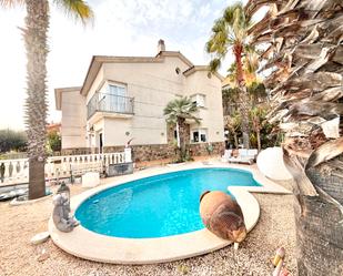 Exterior view of Single-family semi-detached for sale in Tiana  with Private garden, Swimming Pool and Furnished