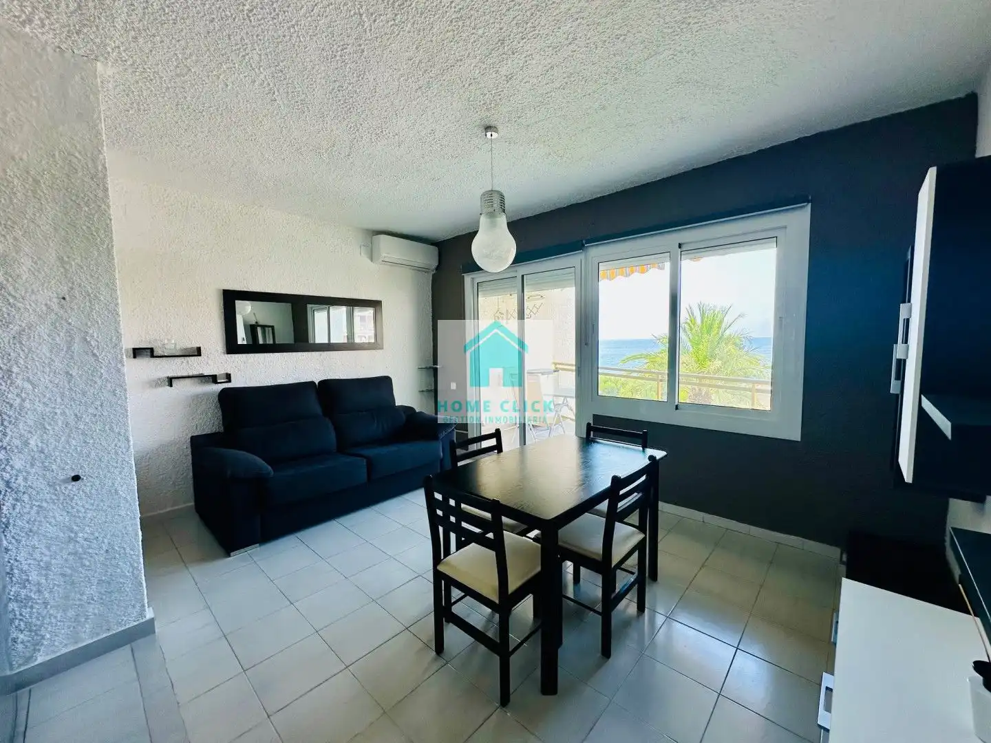 Sala d'estar de Apartament de lloguer en Mont-roig del Camp amb Aire condicionat, Calefacció i Jardí privat