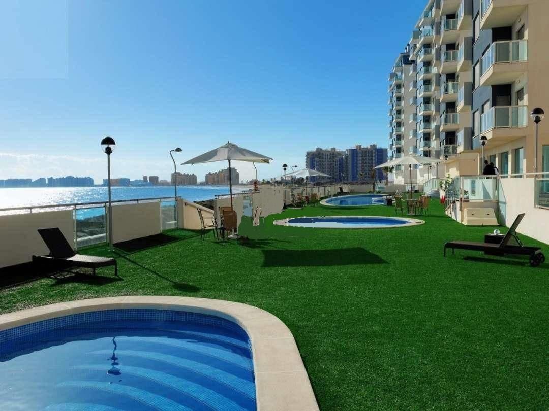 Swimming pool of Apartment for sale in La Manga del Mar Menor  with Air Conditioner, Heating and Terrace