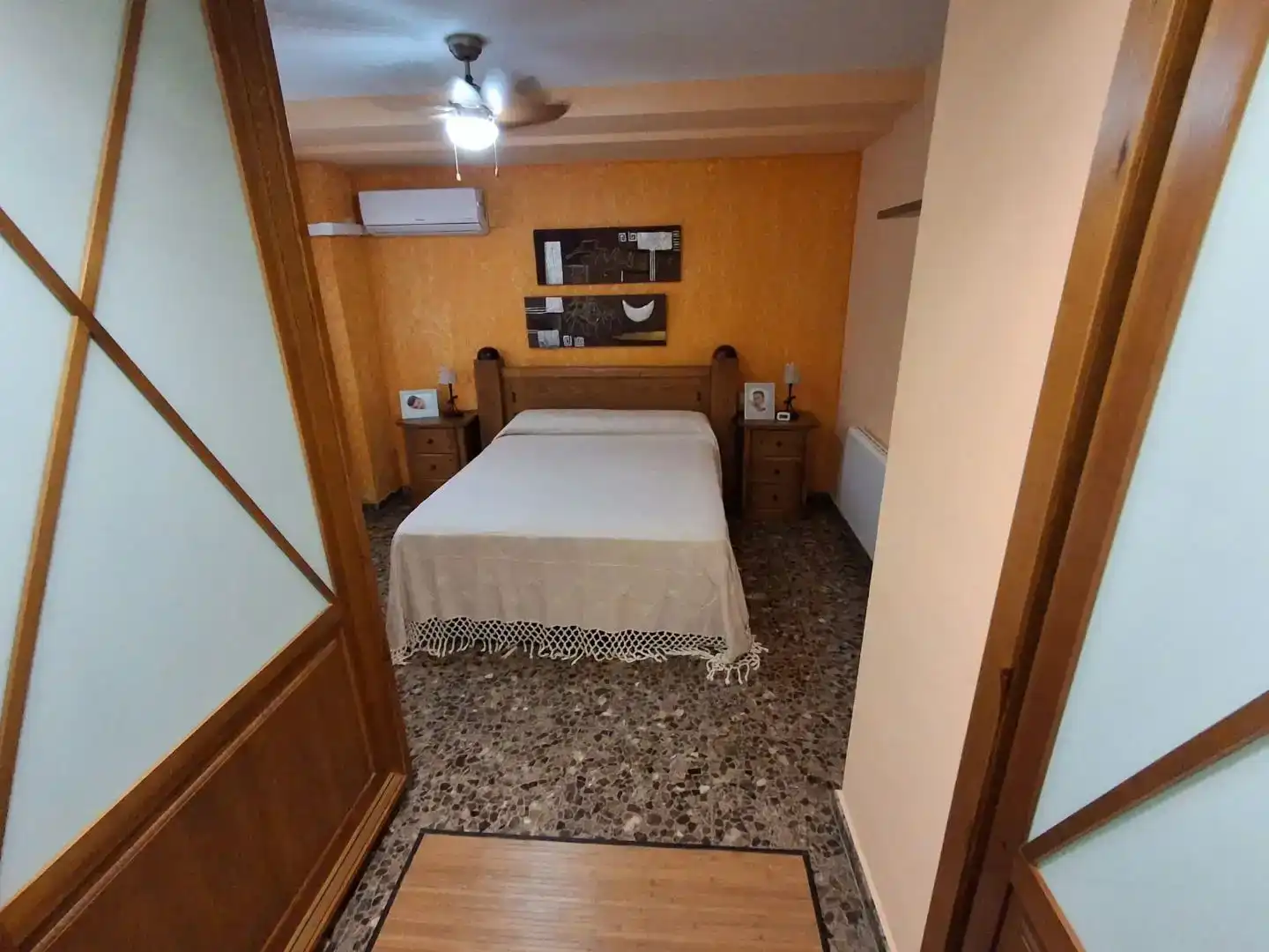 Dormitori de Casa adosada en venda en Sagunto / Sagunt amb Aire condicionat i Piscina