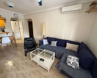 Sala d'estar de Apartament per a compartir en Pilar de la Horadada amb Aire condicionat i Terrassa