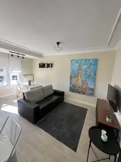 Sala d'estar de Apartament en venda en León Capital  amb Calefacció, Parquet i Terrassa