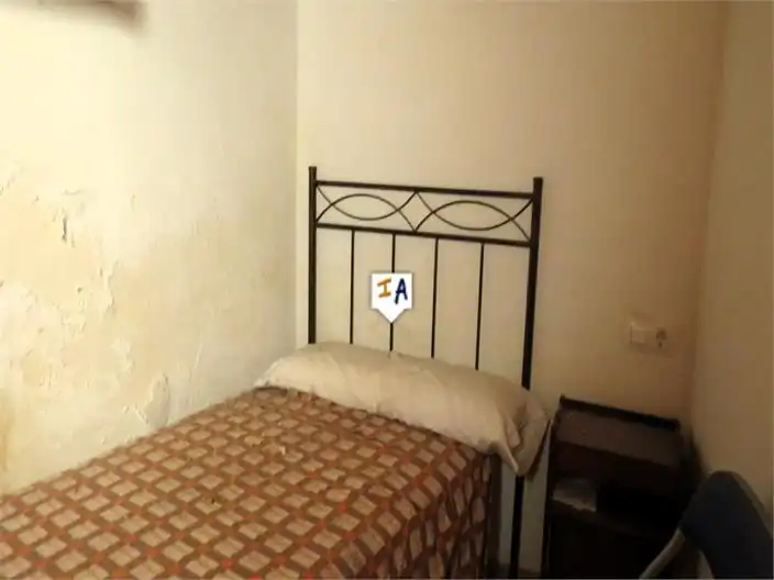 Habitación de Casa adosada en venta en Santiago de Calatrava con Terraza y Trastero