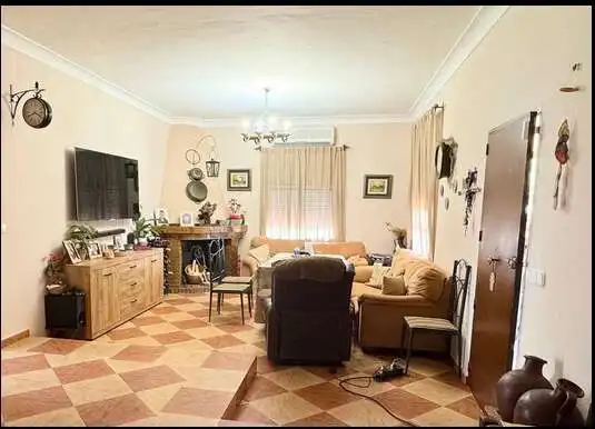 Living room of Houses for sale in Utrera  with Air Conditioner, Private garden and Storage room