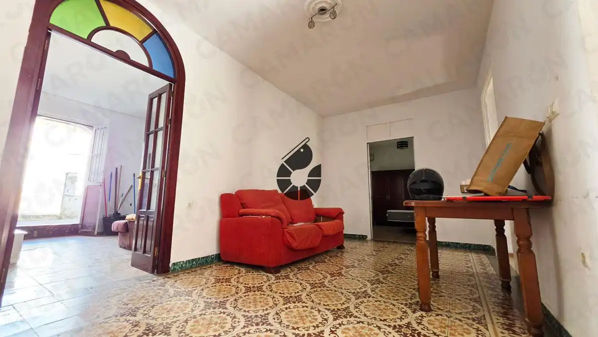 Sala de estar de Casa adosada en venta en Almensilla con Jardín privado, Balcón y Alarma