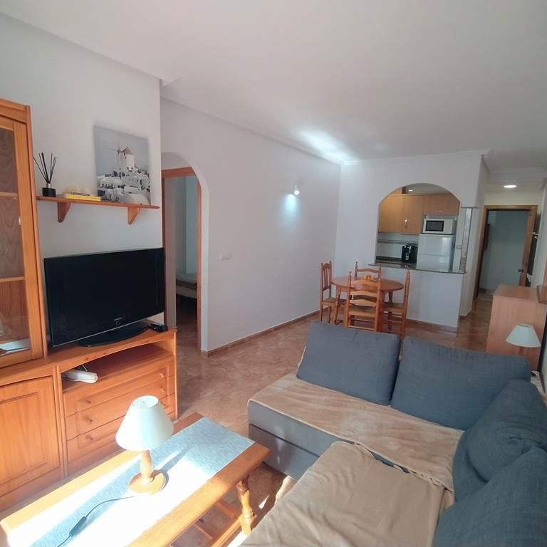 Living room of Flat for sale in Torrevieja  with Air Conditioner, Terrace and Furnished