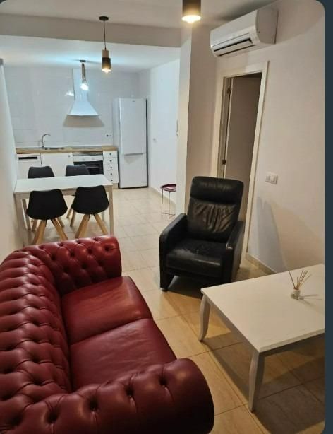 Sala d'estar de Pis de lloguer en El Campello amb Calefacció, Jardí privat i Piscina comunitària