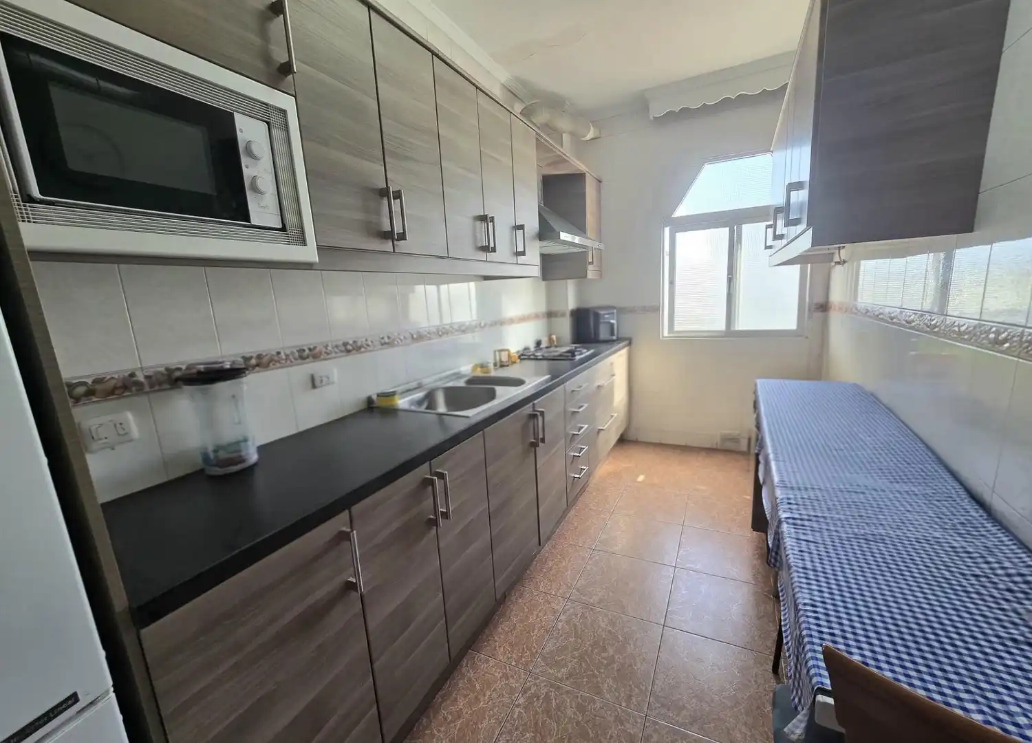 Kitchen of Flat for sale in Málaga  with Terrace, Storage room and Furnished