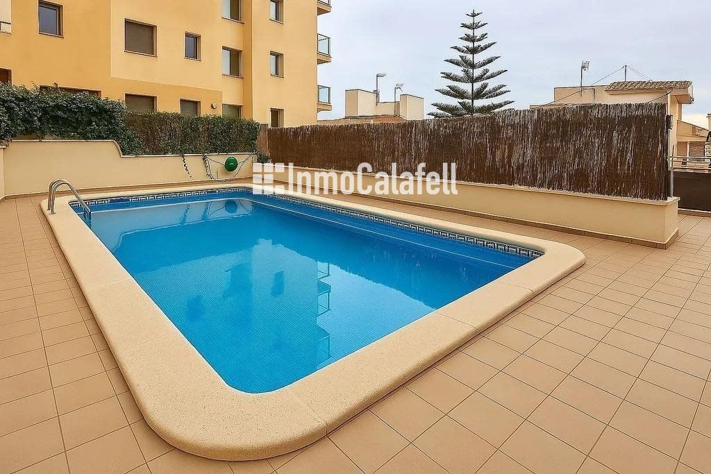 Swimming pool of Attic for sale in Calafell  with Air Conditioner, Heating and Terrace
