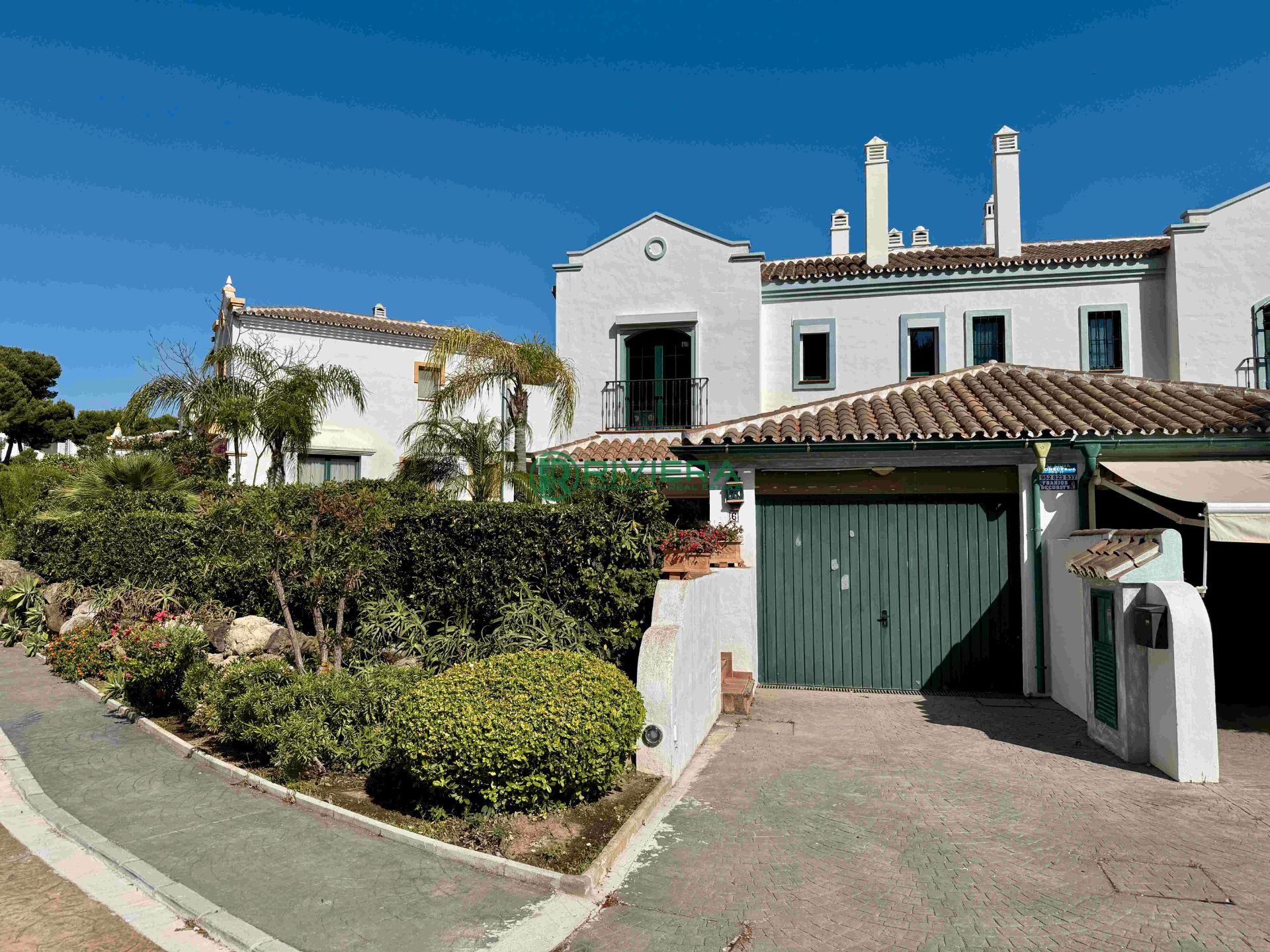 Exterior view of Single-family semi-detached for sale in Mijas  with Air Conditioner, Heating and Private garden