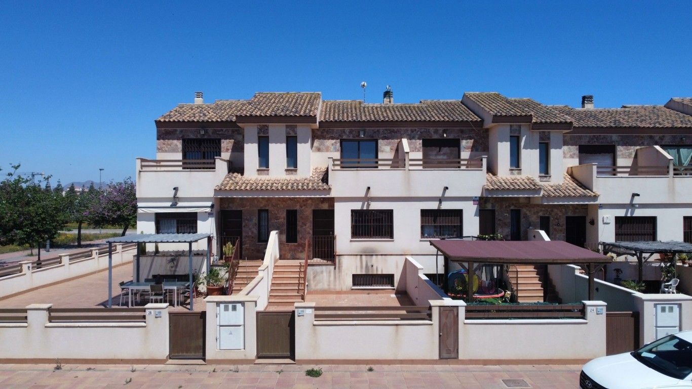 Vista exterior de Casa adosada en venta en Los Alcázares con Terraza, Piscina y Horno