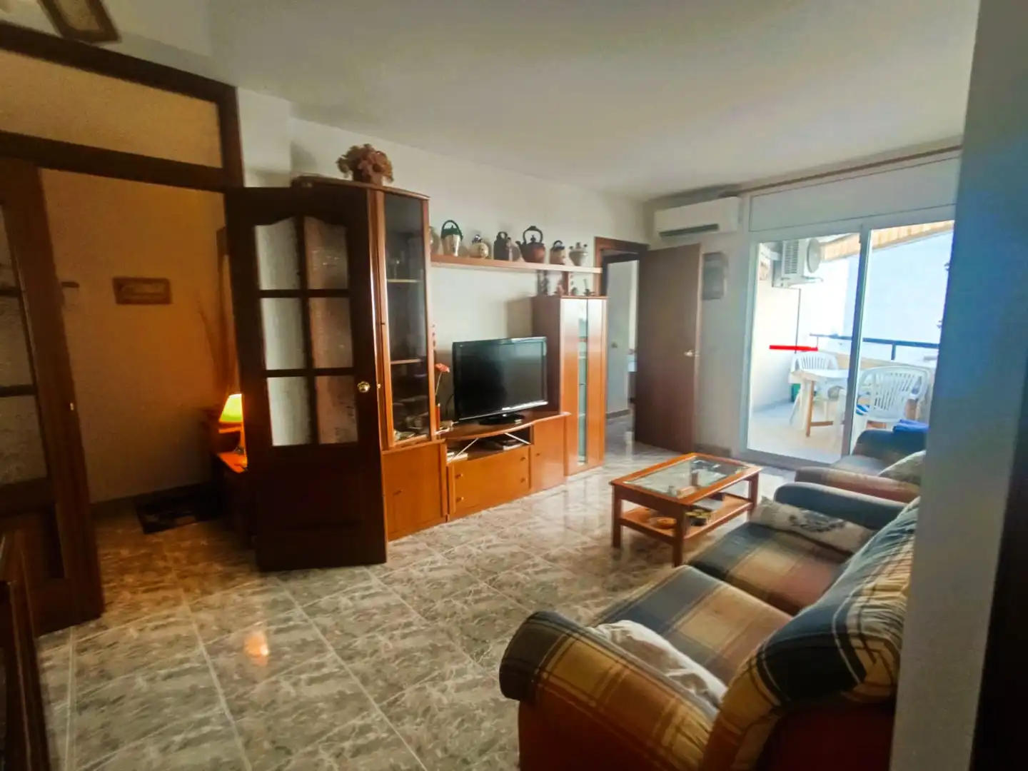 Living room of Flat for sale in Cunit  with Air Conditioner, Storage room and Furnished