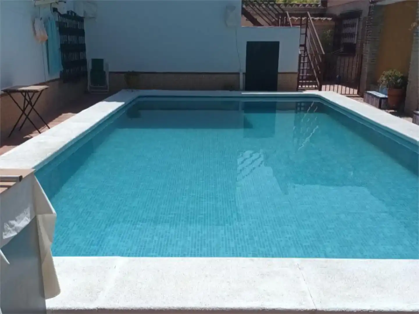 Swimming pool of Houses for rent in Gines  with Air Conditioner, Private garden and Storage room