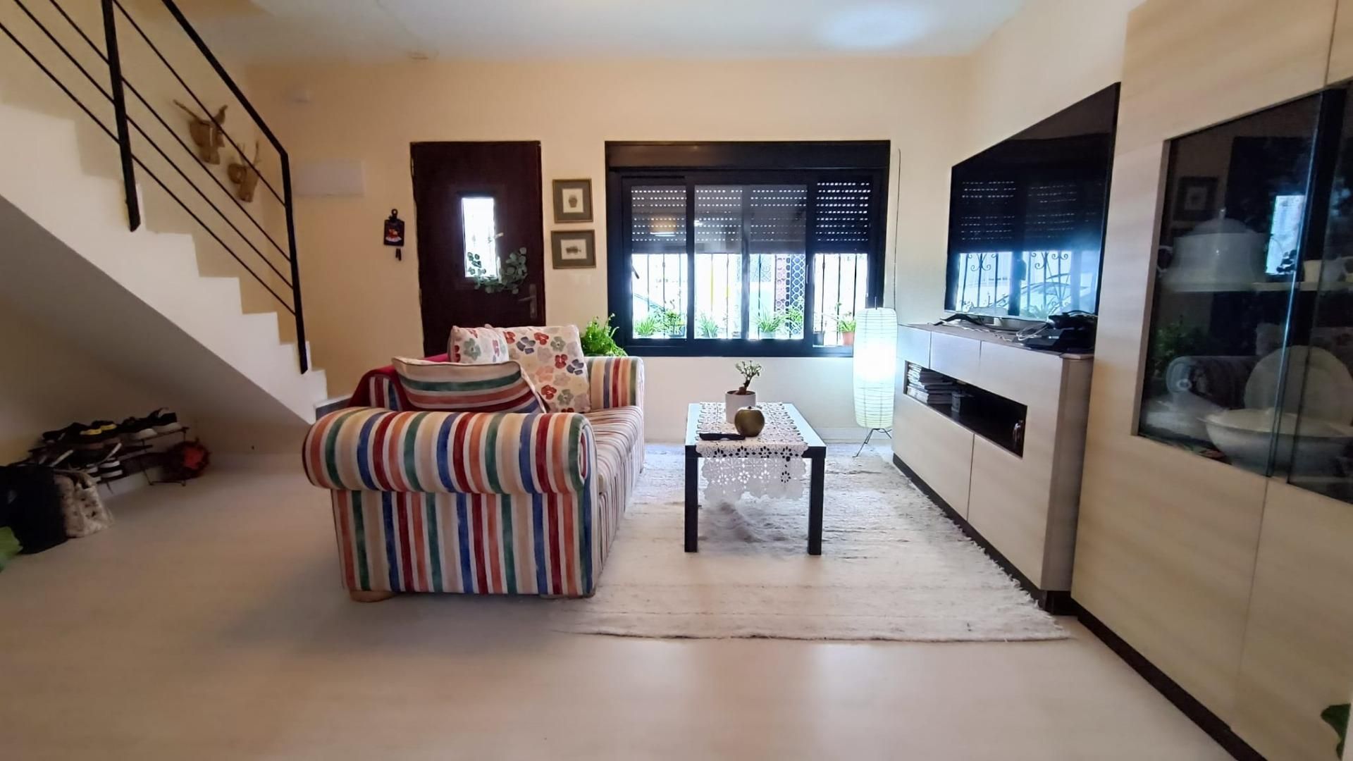 Sala d'estar de Casa o xalet en venda en Benalmádena amb Aire condicionat i Terrassa